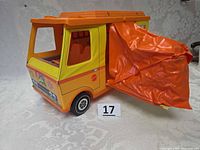 Front and side view of Barbie Country Camper showing vinyl tent deployed