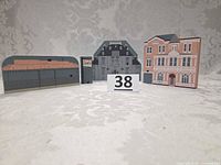 Front view of all four Cat's Meow blocks with lot number card