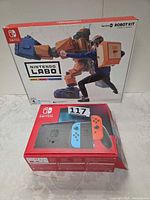 Front view of Nintendo Switch retail box and Nintendo Labo Robot Kit box together