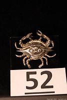 Front view of sterling silver crab brooch-pendant