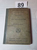 Front cover showing title, series, publisher, lot number card 89