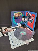 Record, inner sleeve, gatefold jacket and booklet spread out