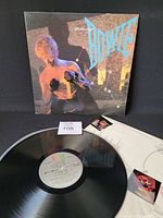 Front jacket, record on EMI America label, inner sleeve visible