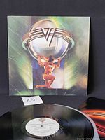 Front jacket showing Atlas artwork and catalog number