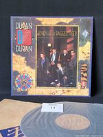 Front cover of LP with inner sleeve and disc partially visible