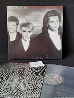 Front album cover with band portrait