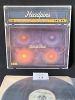 Front jacket showing Headpins Turn It Loud cover art