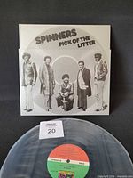 Front cover and record showing title and artist