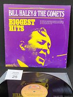 Front jacket and record partially visible