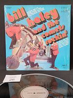 Front cover of Bill Haley and the Comets Rockin' LP with record partially visible