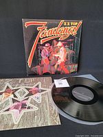 Front of jacket showing album artwork and title