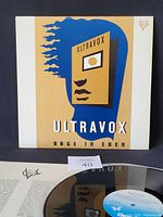 Front cover, partial view of record and lyric inner sleeve