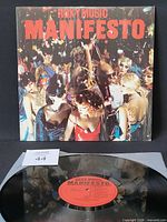 Front album cover and vinyl disc