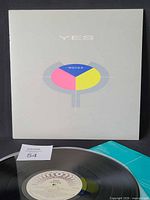 Front of jacket, record partially visible, inner sleeve corner