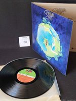 Front gatefold sleeve and record on inner sleeve