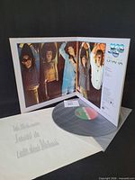 Gatefold interior with lyric sleeve and vinyl disc