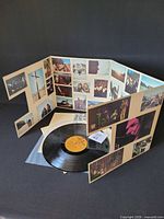 Multifold gatefold jacket displayed with both LPs and inner sleeves