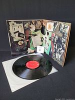 Front gatefold open with record and inner sleeve visible