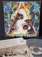 Front cover and inner sleeve with vinyl partially visible