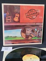 Front cover showing album art and shrinkwrap