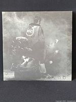 Front gatefold cover featuring rider with WHO jacket