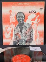 Front jacket showing album artwork and artist