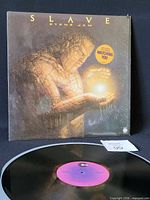 Front album cover with vinyl partially shown