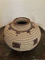 Overall view of woven basket pot on table