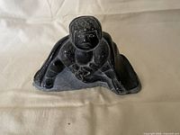 Front view of soapstone Inuit carving
