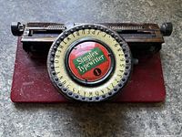 Top view showing circular index dial and carriage