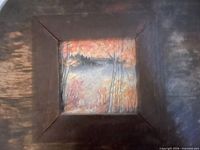 Front view of framed painting