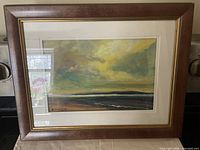 Front view of framed painting showing artwork, mat and frame