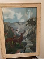 Front view of framed painting showing full artwork and frame