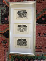 Full view of framed trio of prints
