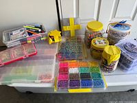 overview of bead containers and pens
