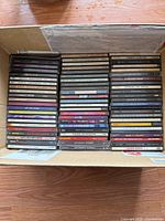 Top view of box containing two stacks of CDs