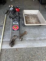Two gas trimmers, pole saw, yard cart