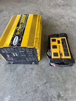 Front view of Go Power inverter showing AC outlets and Mastercraft outlet box