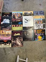 Grid view of all vinyl records laid out on floor