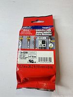 Front view of sealed Brother TZe-S241 tape package showing model and size