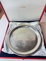 Tray inside open presentation box with cloth