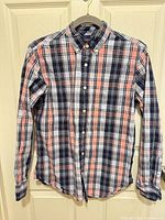 Front view of plaid button-up shirt