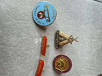 Front view of all five Shriners Aahmes lapel pins