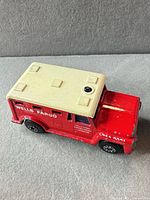 Side and roof view showing Wells Fargo markings and paint wear