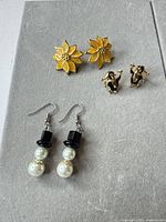 All three pairs of earrings laid out