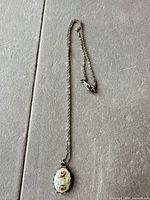 Full view of pendant necklace laid out