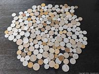 Overhead view of entire spread of assorted coins