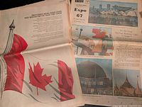 Two open newspapers showing Expo 67 cover and pavilion images