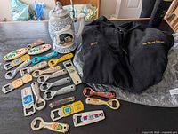 Group shot of fleece, stein and bottle openers spread on table