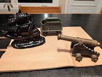 All three metal items grouped on table